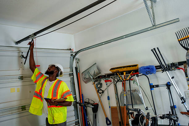 Professional Garage Door Panel Replacement technician working in Ravena, NY